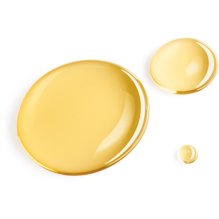 Elizabeth Arden Eight Hour All-Over Miracle Oil 100 ml kosteuttava vartaloöljy ja sen kultaiset, läpikuultavat öljypisarat.