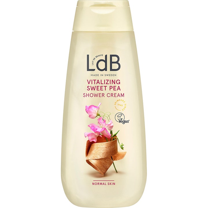 LdB Vitalizing Sweet Pea Shower Cream elvyttävä suihkuvoide vaaleassa pullossa, jossa on pinkkejä kukkia.