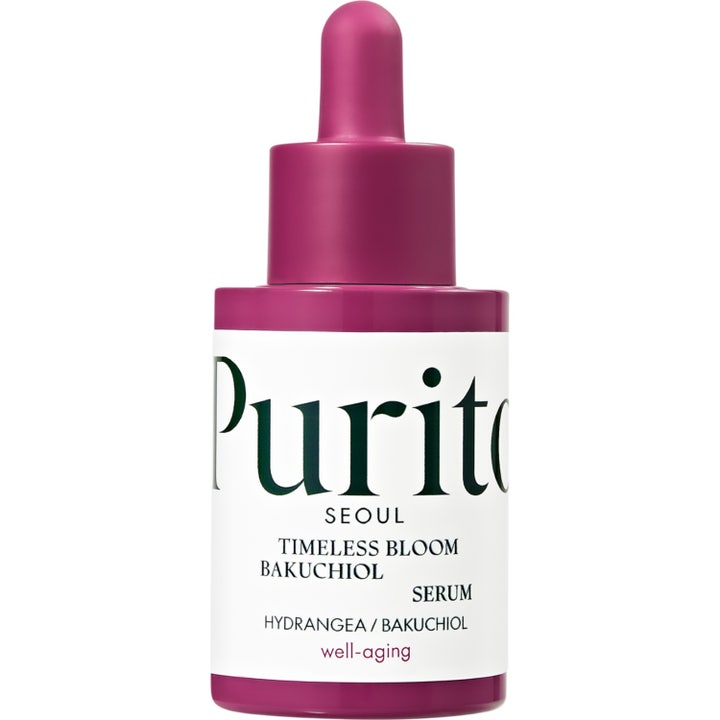 Purito Seoul Timeless Bloom Bakuchiol Serum 30 ml uudistava well-aging kasvoseerumi lila pullossa, jossa on pipetti.