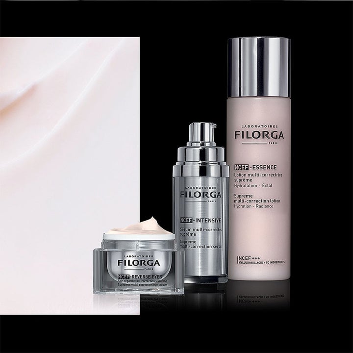 Filorga Lifting & Firming Set ihonhoitosetti sisältää hopeisia pakkauksia ja vaaleanpunaisen voiteen koostumusta.