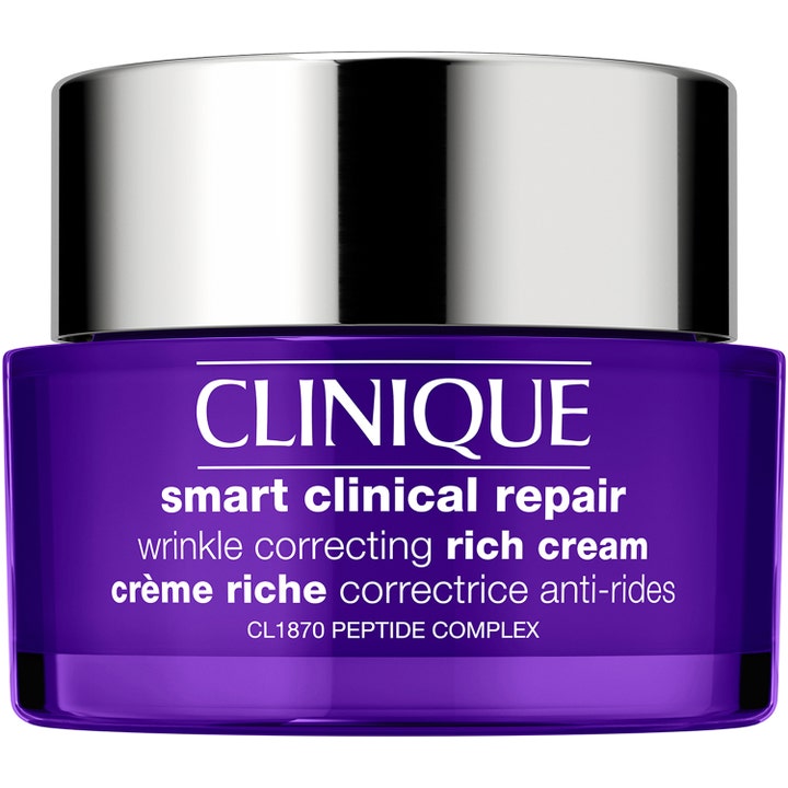 Clinique Smart Clinical Repair Wrinkle Correcting Rich Cream silottaa ryppyjä purppuraisessa lasipurkissa hopeakorkilla.