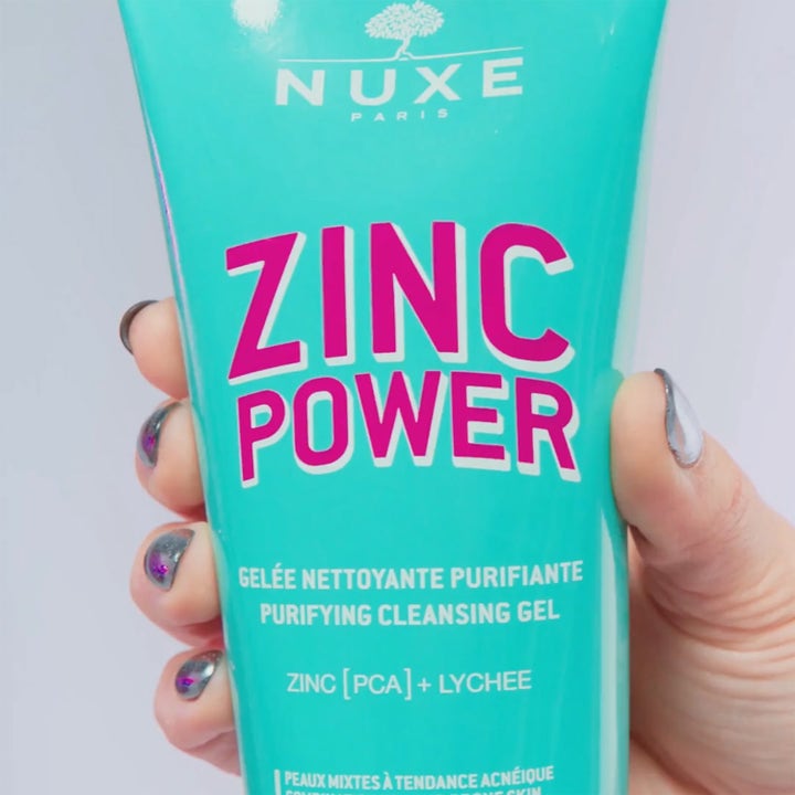 Nuxe Zinc Power Purifying Cleansing Gel 150 ml puhdistusgeeli turkoosissa tuubissa pinkillä tekstillä.