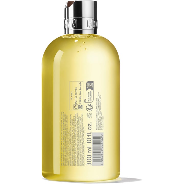 Molton Brown Orange & Bergamot Bath & Shower Gel 300 ml raikastava suihkugeeli kirkkaassa pullossa takaapäin.