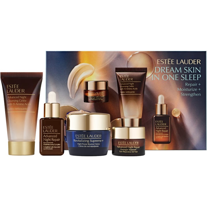Estée Lauder Dream Skin In One Sleep uudistava hoitosetti ruskeissa ja sinisissä pakkauksissa kultaisilla korkeilla.