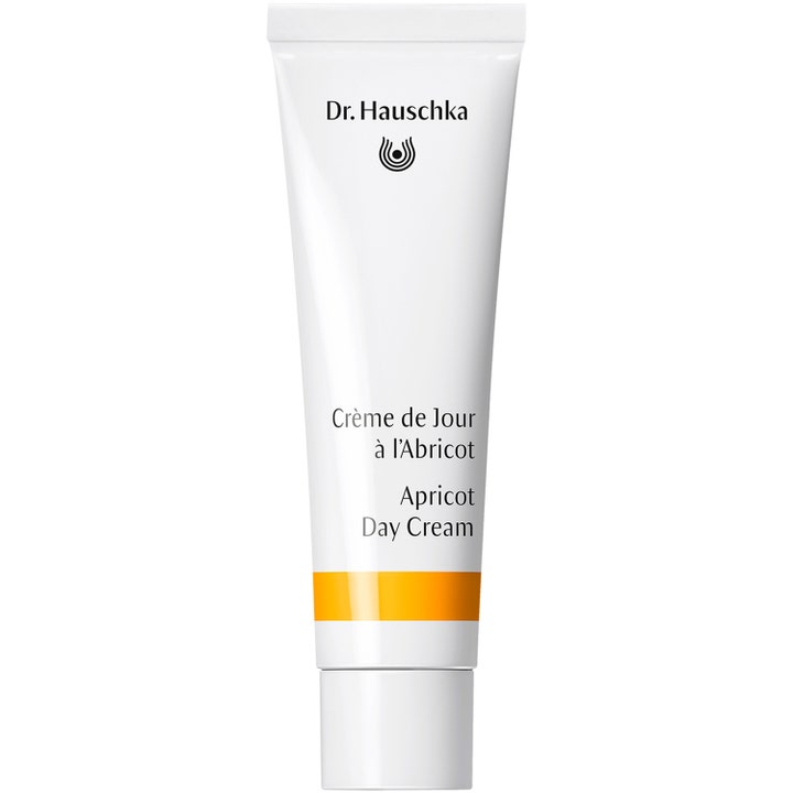 Dr. Hauschka Apricot Day Cream elvyttävä päivävoide valkoisessa tuubissa jossa on oranssi raita ja valkoinen korkki
