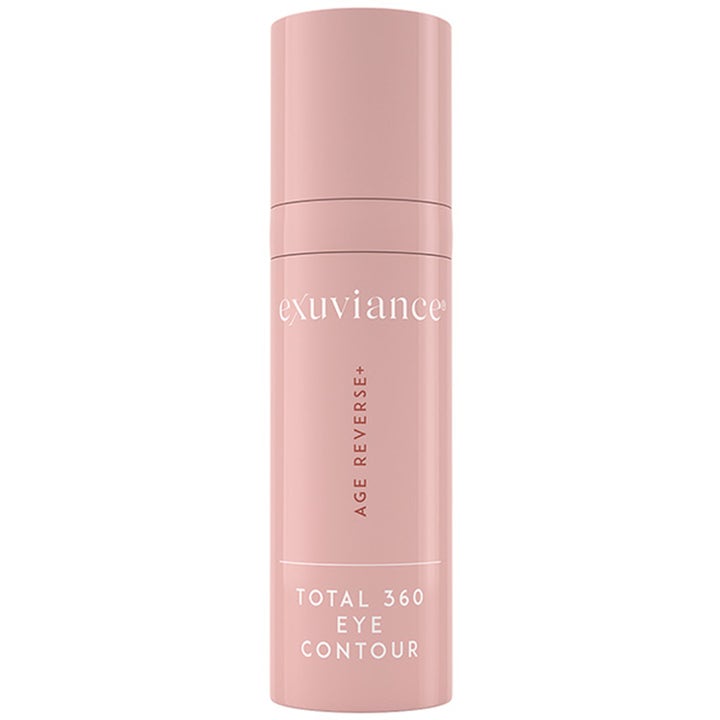 Exuviance Age Reverse+ Total 360 Eye Contour kiinteyttävä silmänympärysvoide vaaleanpunaisessa sylinteripullossa.