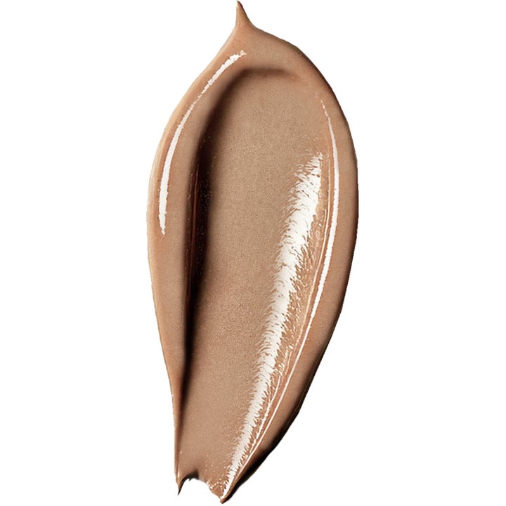 Verso N°2 Daily Glow 30 ml heleyttävä seerumi, jossa on kimalteleva ja täyteläinen vaaleanruskea koostumus.