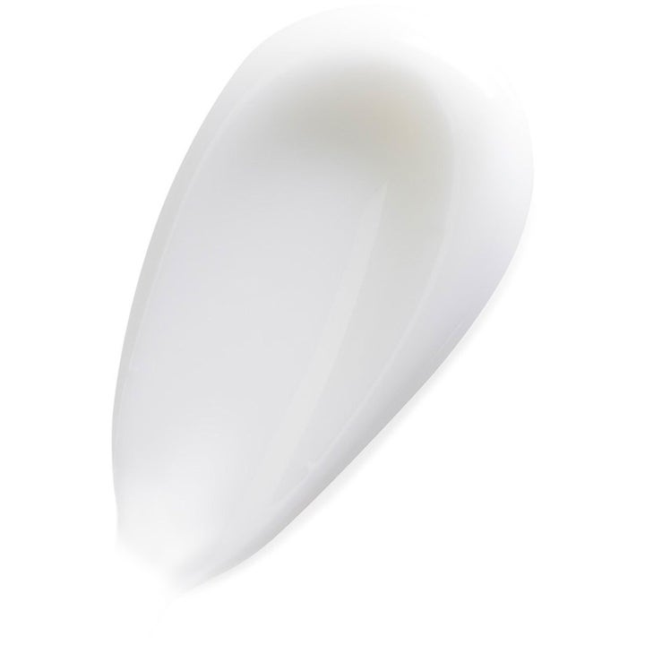 L'Oréal Paris Kraftfull Anti-Age 65 ml niasiiniamidia sisältävä voide, jossa on kevyt ja sileä valkoinen koostumus.