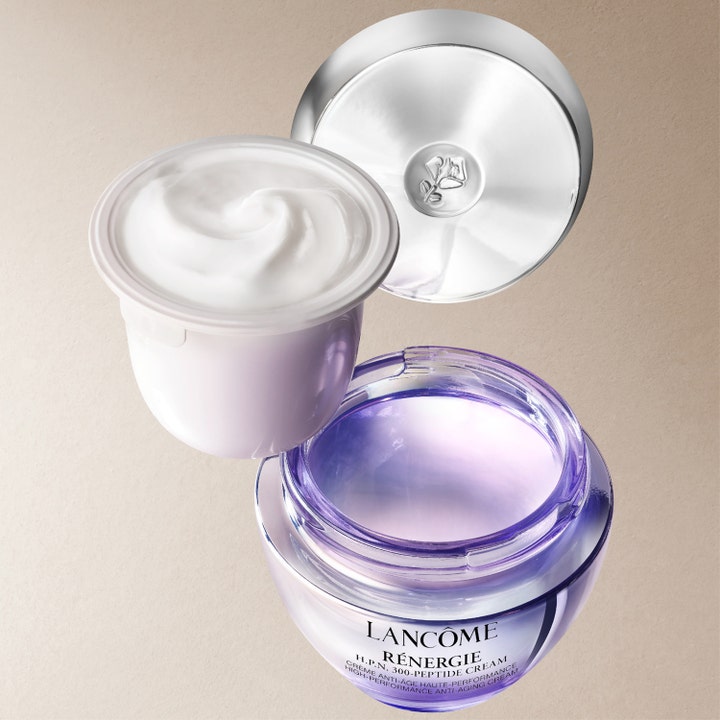 Lancôme Rénergie H.P.N. UVMUNE Cream SPF50 50 ml täyttöpakkaus ja täyteläinen kasvovoide violetissa lasipurkissa.
