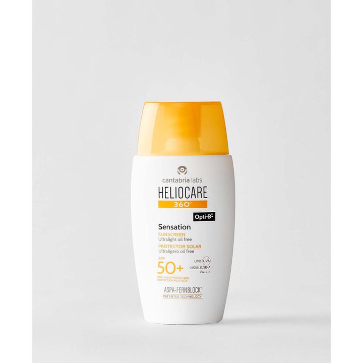 Heliocare 360 Sensation SPF 50+ 50 ml suojavoide kasvoille valkoisessa pullossa oranssilla korkilla