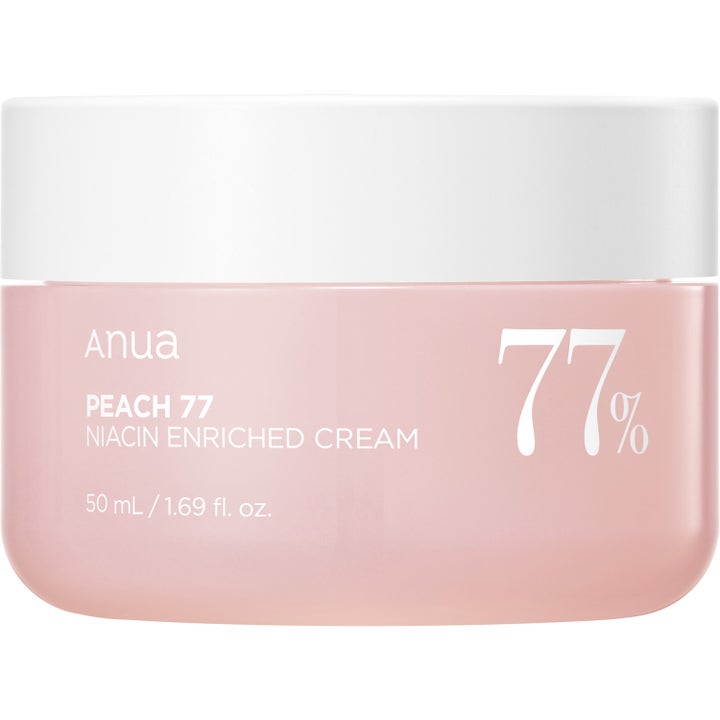 Anua Peach 77 Niacin Enriched Cream 50 ml heleyttävä kasvovoide vaaleanpunaisessa purkissa.