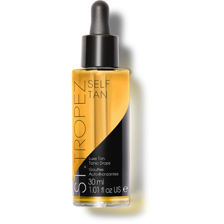 St. Tropez Luxe Tan Tonic Drops 30 ml hehkua antavat itseruskettavat tipat kirkkaassa lasipullossa mustalla pipetillä