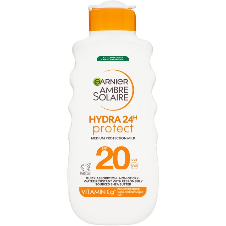 Garnier Ambre Solaire Hydra 24h Protect SPF 20 aurinkovoide valkoisessa aaltomaisessa pullossa oranssilla korkilla
