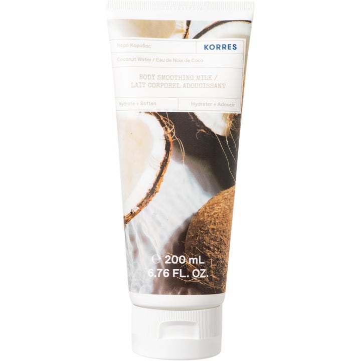 Korres Body Smoothing Milk Coconut Water 200 ml pehmentävä vartalomaito kookoskuvioidussa valkoisessa tuubissa.