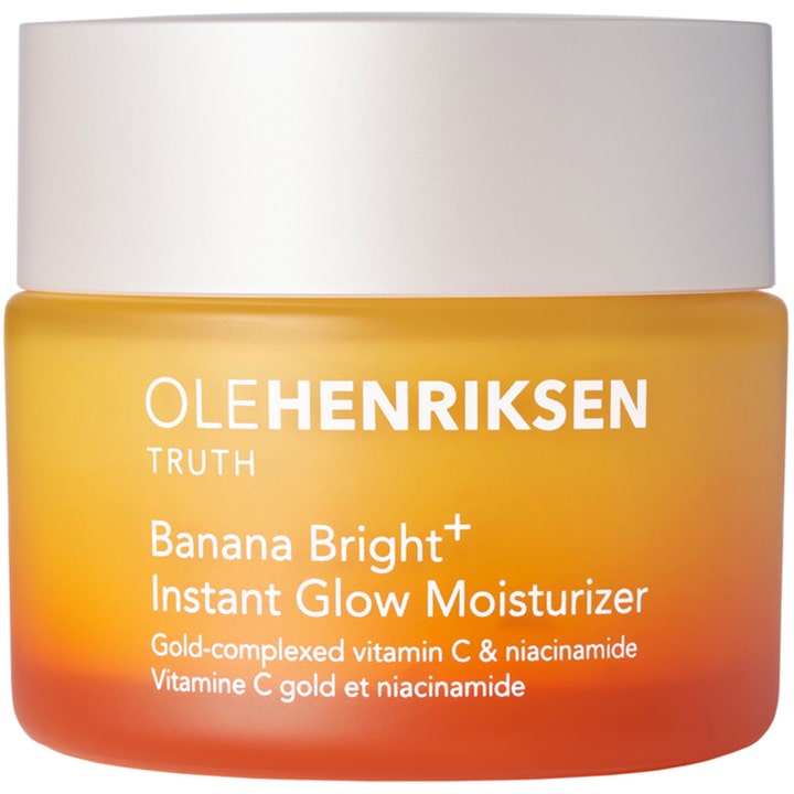 Ole Henriksen Banana Bright+ Instant Glow Moisturizer kirkastava kasvovoide oranssissa liukuvärjätyssä lasipurkissa.