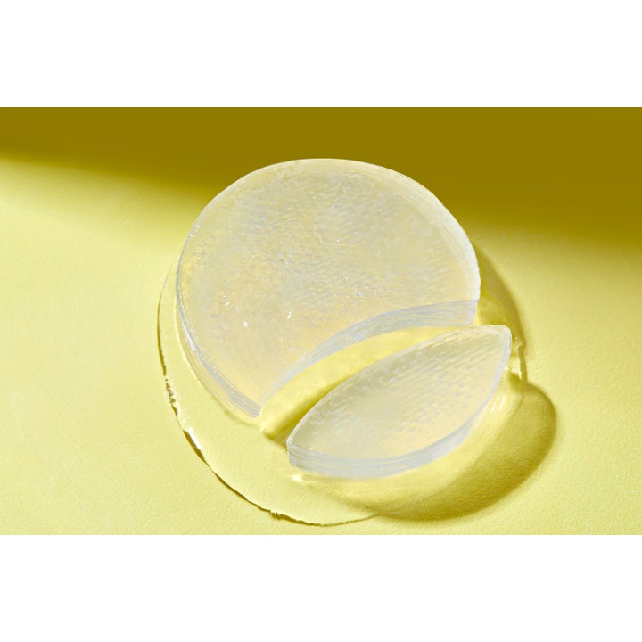 COSRX Advanced Snail Hydrogel Eye Patches 60 kpl kosteuttavat silmänympäryslaput kirkkaalla hunajakennokuvioinnilla.