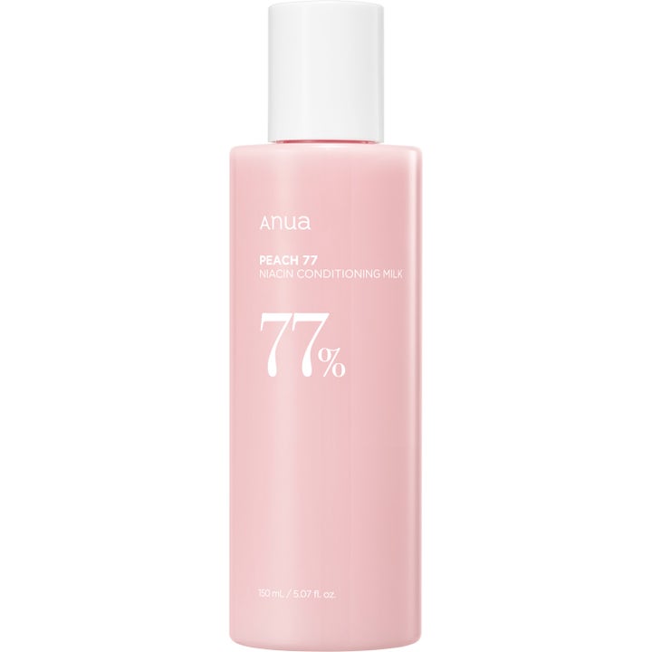 Anua Peach 77 Niacin Conditioning Milk 150 ml heleyttävä kasvoemulsio vaaleanpunaisessa pullossa valkoisella korkilla.