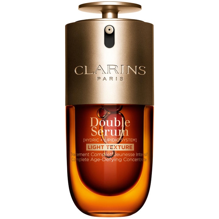 Clarins Double Serum Light Texture 50 ml ihoa kiinteyttävä seerumi kultaisessa pumppupullossa.