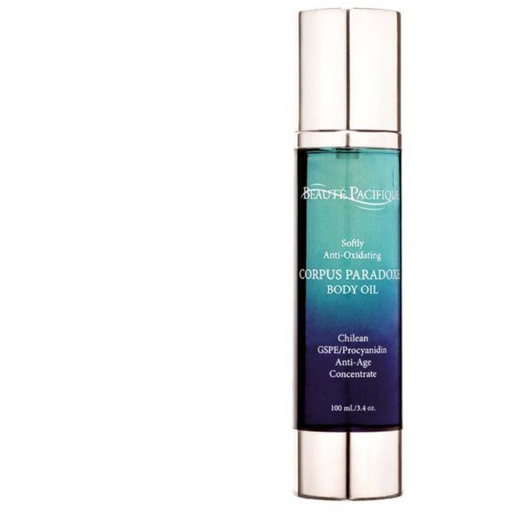 Beauté Pacifique Corpus Paradoxe Body Oil 100 ml anti-age vartaloöljy hopeakantisessa pullossa jossa on sinertävä neste