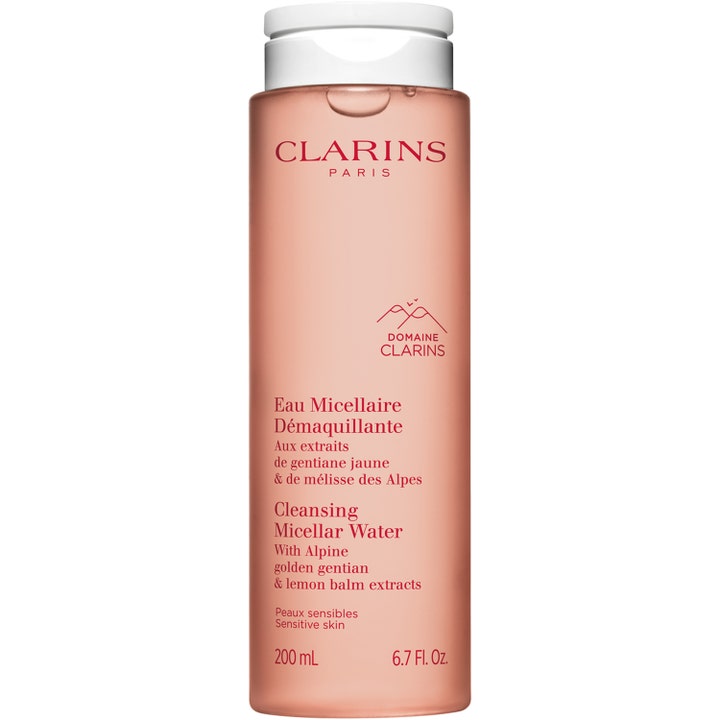 Clarins Cleansing Micellar Water 200 ml rauhoittava misellivesi persikanvärisessä pullossa valkoisella korkilla