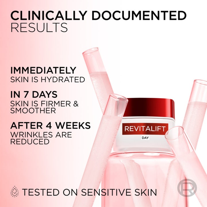 L'Oréal Paris Revitalift Day Cream 50 ml silottava päivävoide lasipurkissa koeputkien ja kliinisten tulosten kera.