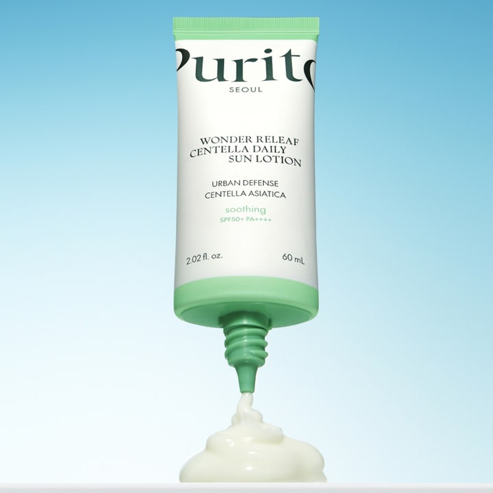 Purito Wonder Releaf Centella Daily Sun Lotion 60 ml rauhoittava aurinkovoide, täyteläinen ja valkoinen voidekoostumus
