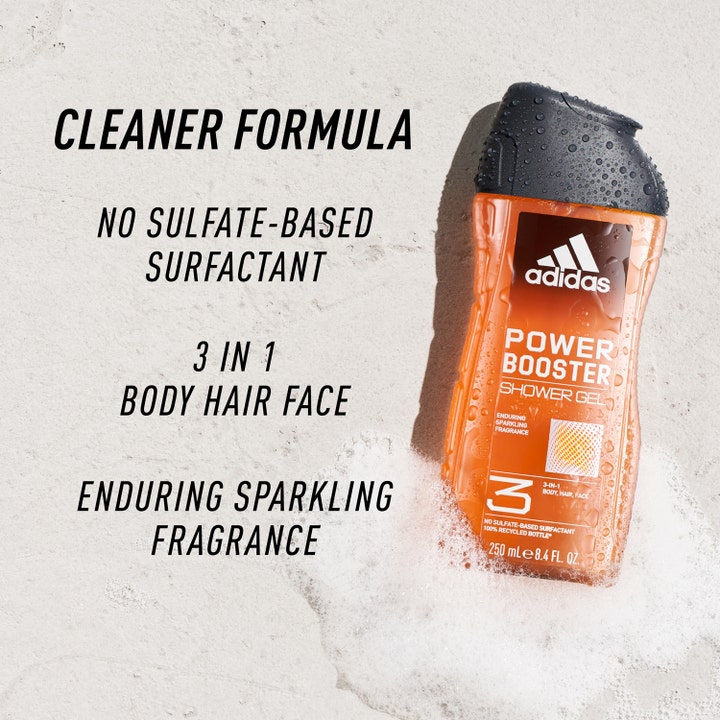 Adidas Power Booster 250 ml sulfaatiton suihkugeeli puhdistaa ihon ja hiukset oranssissa pullossa vaahdon keskellä