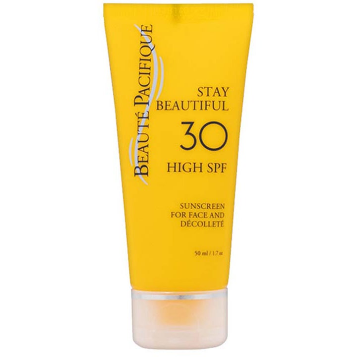 Beauté Pacifique Stay Beautiful 50 ml suojaava aurinkovoide kasvoille keltaisessa tuubissa jossa on kirkas korkki
