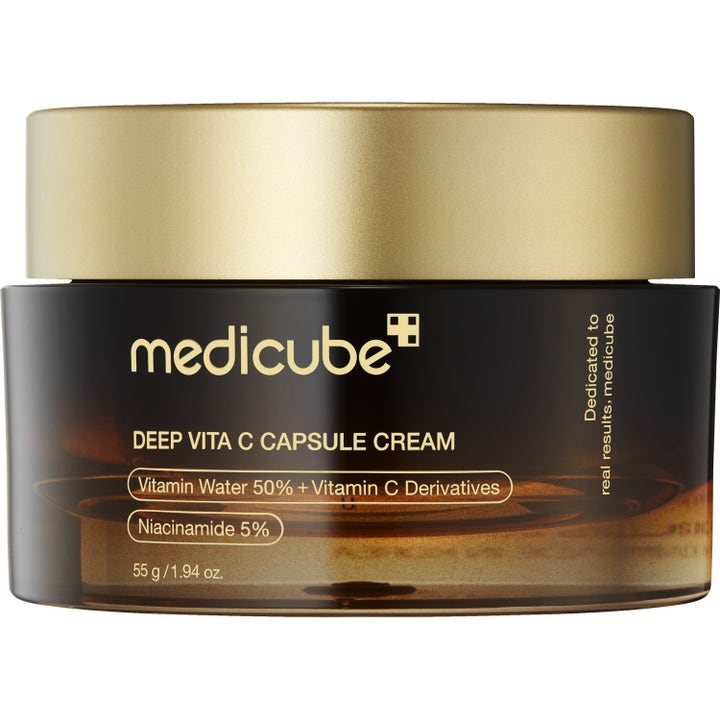 Medicube Deep Vita C Capsule Cream 55 g kirkastava kasvovoide tummanruskeassa lasipurkissa, jossa on kultainen kansi.