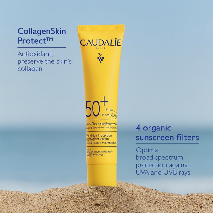 Caudalie Vinosun Lightweight Fluid 40 ml aurinkovoide hiekalla CollagenSkin Protect -teknologialla.