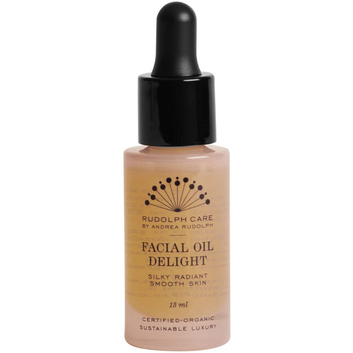 Rudolph Care Facial Oil Delight 15 ml heleyttävä kasvoöljy mustalla pipetillä varustetussa huurteisessa lasipullossa.