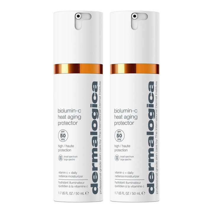 Dermalogica Biolumin-C Heat Aging Protector 50 ml kirkastava SPF 50 päivävoide kaksi valkoista pumppupulloa oranssilla raidalla