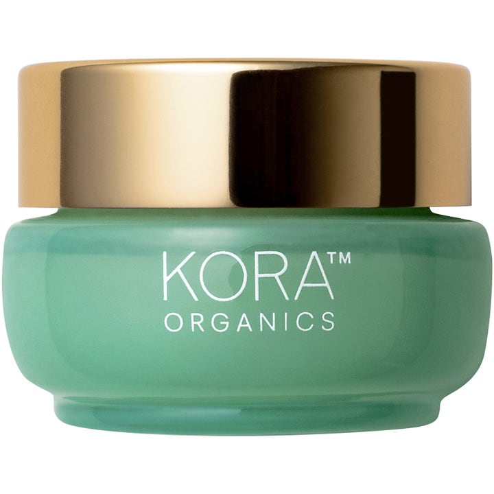 Kora Organics Turmeric Glow Moisturizer 50ml heleyttävä kasvovoide vihreässä lasipurkissa jossa on kultainen kansi