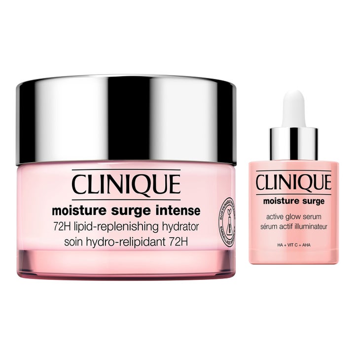 Clinique Moisture Surge Intense kasvovoide ja Active Glow Serum heleyttävä seerumi vaaleanpunaisissa pakkauksissa.