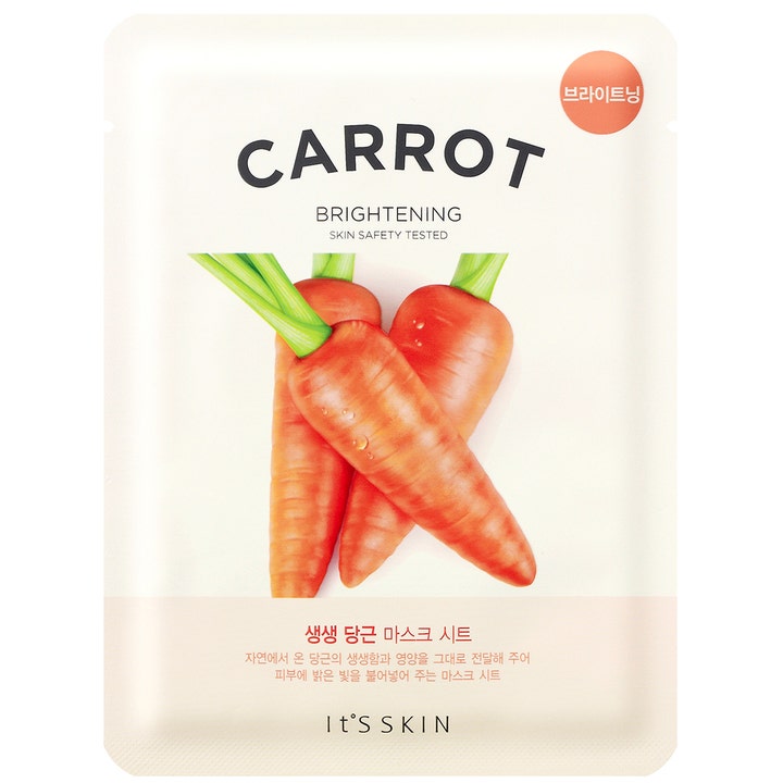 It'S SKIN Carrot Brightening kirkastava kangasnaamio valkoisessa pakkauksessa, jossa on kuva kolmesta oranssista porkkanasta.