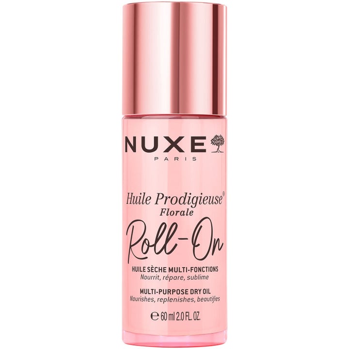 Nuxe Huile Prodigieuse Florale Roll-On 60 ml ravitseva kuivaöljy vaaleanpunaisessa pullossa metallinhohtoisella korkilla
