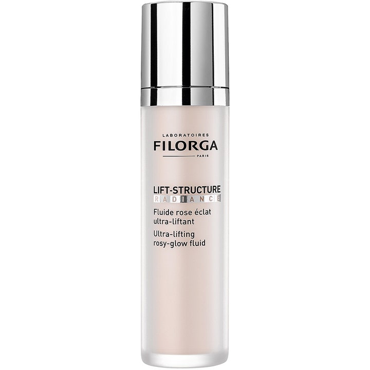 Filorga Lift-Structure Radiance 50 ml kiinteyttävä ja heleyttävä emulsio hopeakorkkisessa pullossa, jossa on vaaleanpunaista voidetta.