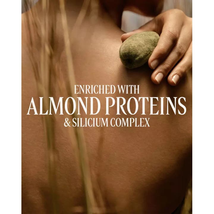 L'Occitane en Provence Almond Milk Concentrate 200 ml silottava vartalovoide, teksti Almond Proteins & Silicium Complex.
