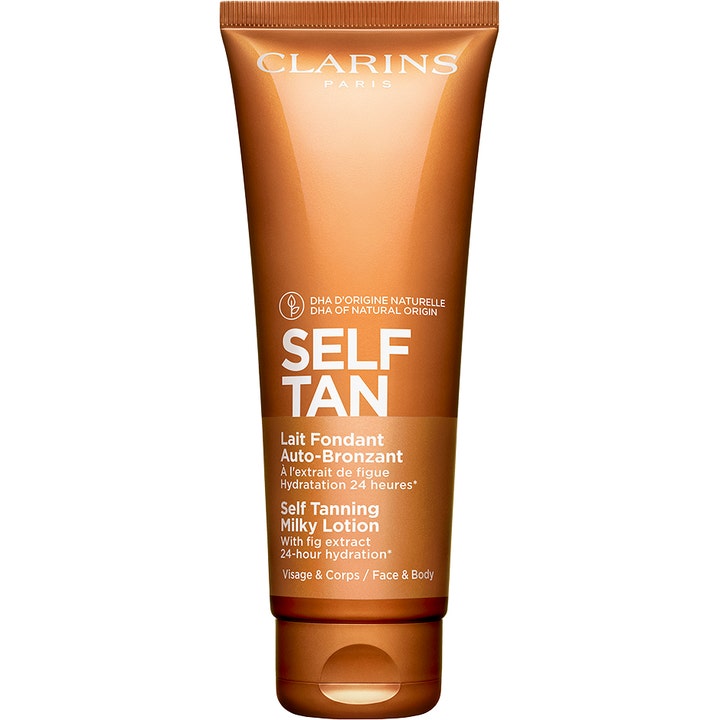 Clarins Self Tanning Milky Lotion itseruskettava voide antaa päivettyneen hehkun ja kosteuttaa pronssisessa tuubissa