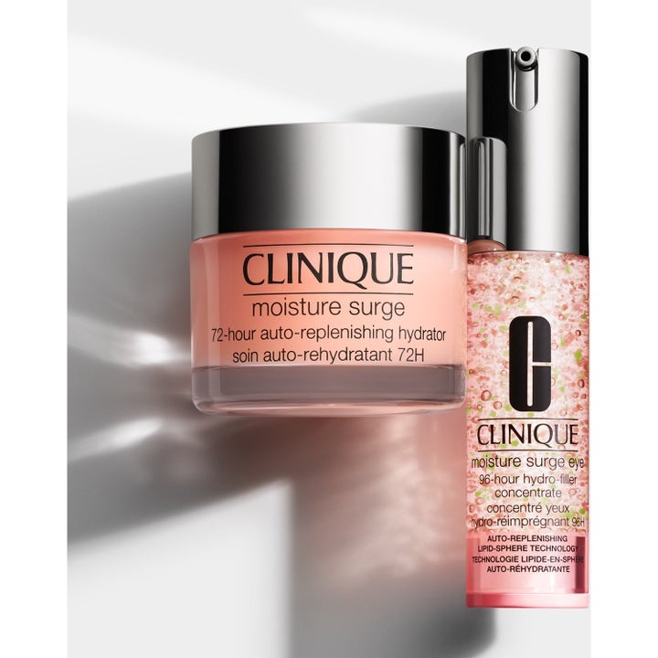 Clinique Total Eye Care 30 ml kosteuttava ihonhoitosetti jossa vaaleanpunainen geelivoide ja seerumi hopeisilla korkeilla