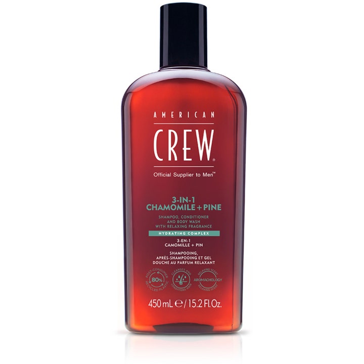 American Crew 3-in-1 Chamomile + Pine 450 ml puhdistava monitoimituote ruskeassa läpinäkyvässä muovipullossa.