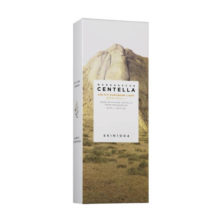SKIN1004 Madagascar Centella Air-Fit Suncream Light 50 ml rauhoittava aurinkovoide valkoisessa pakkauksessa vuoristokuvalla