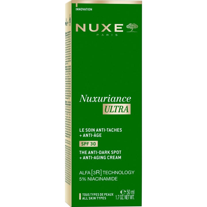 Nuxe Nuxuriance Ultra 50 ml päivävoide SPF 30 häivyttää pigmenttiläiskiä vihreässä pahvipakkauksessa.