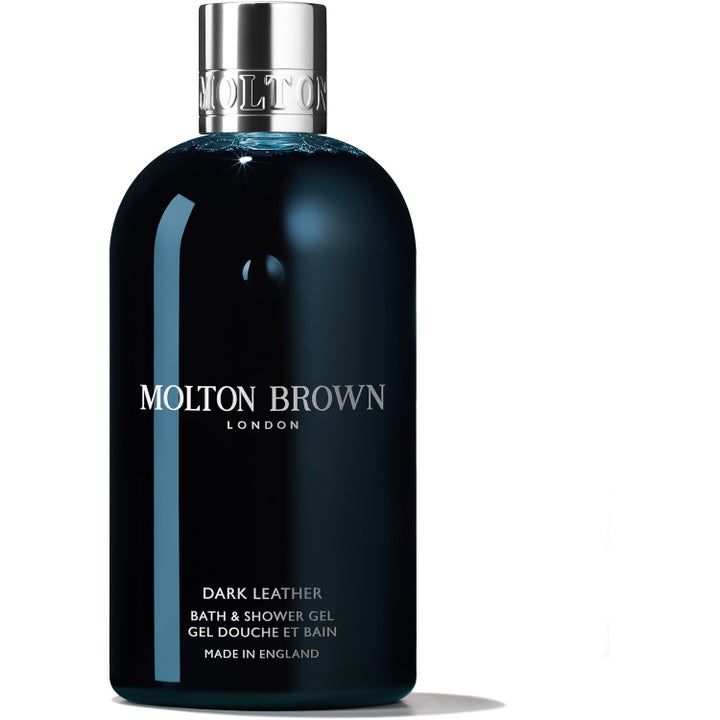 Molton Brown Dark Leather Bath & Shower Gel puhdistava suihkugeeli tummansinisessä pullossa hopeisella korkilla