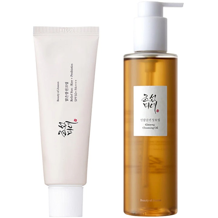 Beauty of Joseon Relief Sun 50ml ja Ginseng Cleansing Oil 210ml aurinkovoide valkoisessa tuubissa ja puhdistava öljy pumpulla.