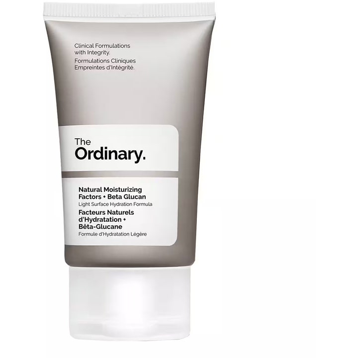 The Ordinary Natural Moisturizing Factors + Beta Glucan kosteuttava kasvovoide harmaassa tuubissa valkoisella korkilla
