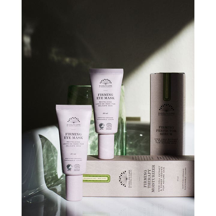 Rudolph Care Firming Eye Mask 20 ml kiinteyttävä silmänympärysnaamio vaaleanvioleteissa tuubeissa ja pahvipakkauksissa.