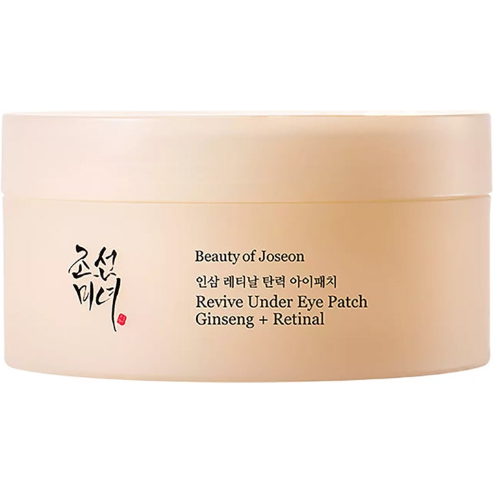 Beauty of Joseon Revive Under Eye Patch Ginseng + Retinal silmänympärysnaamiot vaaleassa pyöreässä purkissa.