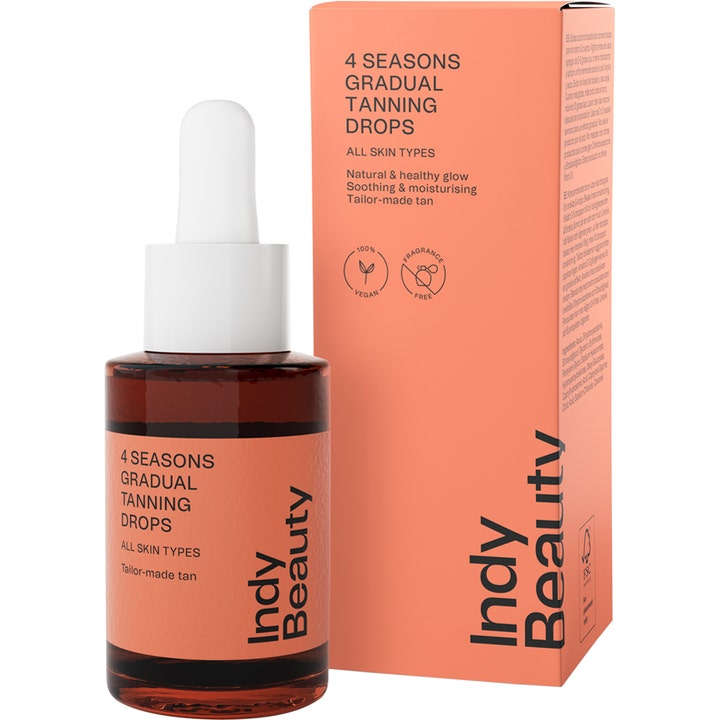 Indy Beauty Gradual Tan Drops 30 ml itseruskettava luo hehkua. Ruskea pipettipullo ja persikanvärinen pakkaus.