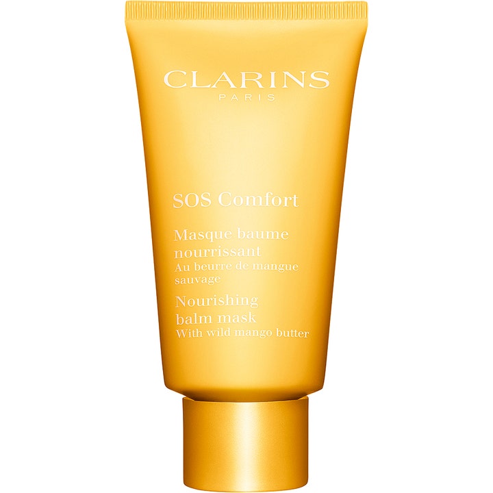 Clarins SOS Comfort Mask 75 ml ravitseva kasvonaamio pehmentää ihoa villimangovoilla keltaisessa tuubissa.